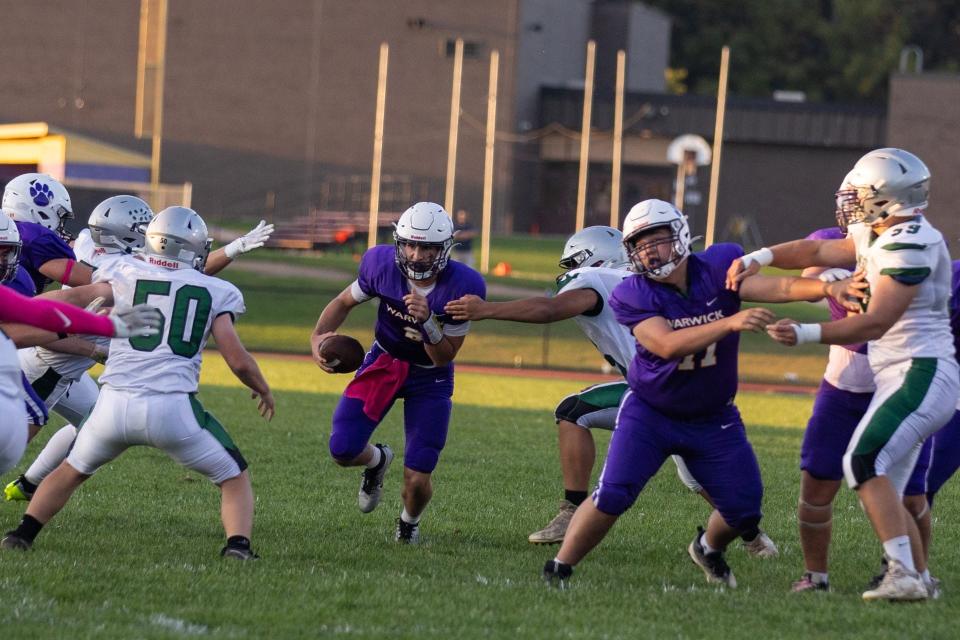 Wils Siebert eyes the gap as Warwick football hosts Minisink Valley on Monday, Oct. 2, 2023.