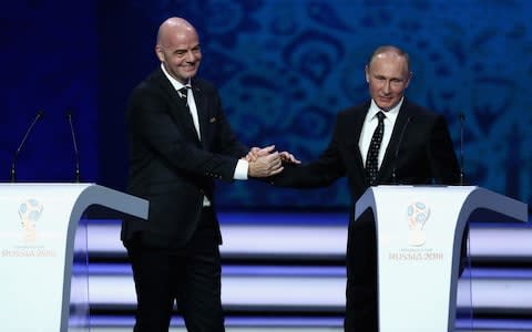 Infantino putin handshake - Credit: FIFA