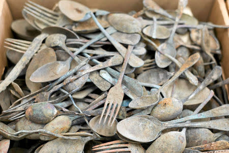 Belongings of the former Nazi death camp of Auschwitz-Birkenau prisoners are presented during a news conference at the Auschwitz Birkenau State Museum in Oswiecim, Poland June 8, 2016. Agencja Gazeta/Lukasz Krajewski/via REUTERS