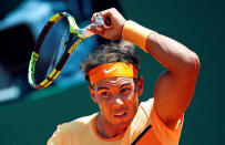 Tennis - Monte Carlo Masters - Monaco, 15/04/2016. Rafael Nadal of Spain plays a shot to Stan Wawrinka of Switzerland. REUTERS/Eric Gaillard