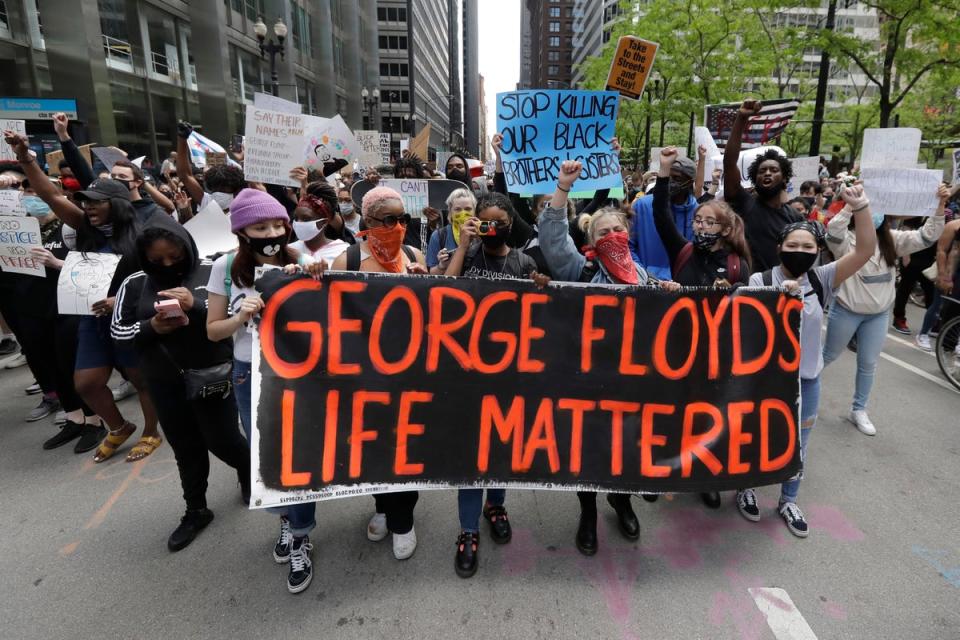 Protestors over George Floyd’s killing (AP)
