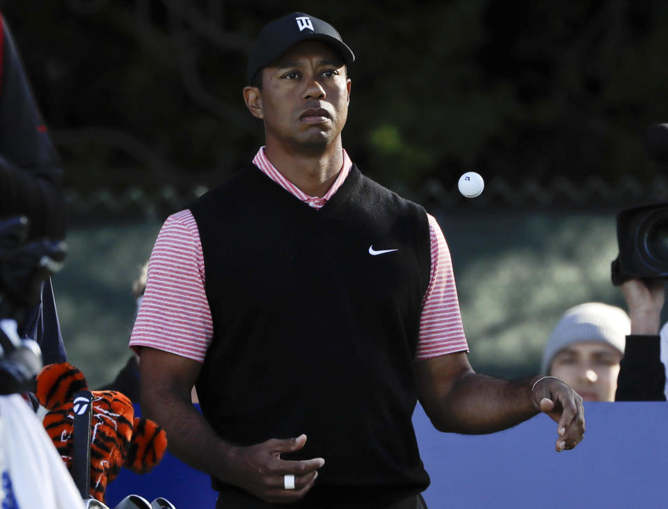 Tiger Woods waits to hit his tee shot on the 11th hole of the South Course at Torrey Pines Golf Course during the final round of the Farmers Insurance golf tournament Sunday, Jan. 27, 2019, in San Diego. (AP Photo/Gregory Bull)