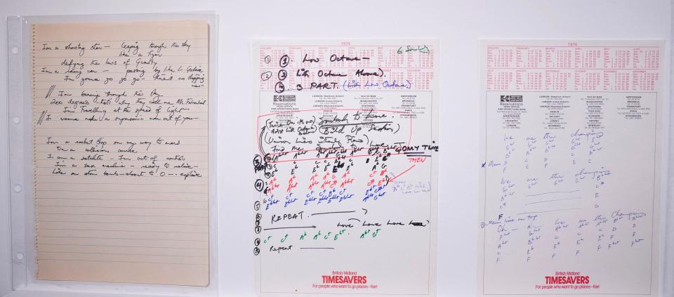 The manuscripts of working lyrics for (L-R) 'Don't Stop Me Now', 'Somebody to Love', and 'We Are The Champions', autographed by British singer-songwriter Freddie Mercury, are displayed during the media preview for 