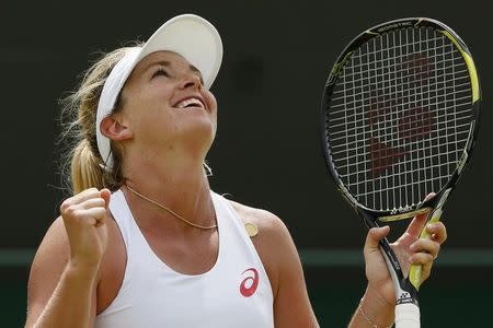 Coco Vandeweghe of the U.S.A. celebrates after winning her match against Lucie Safarova of the Czech Republic at the Wimbledon Tennis Championships in London, July 6, 2015. REUTERS/Stefan Wermuth