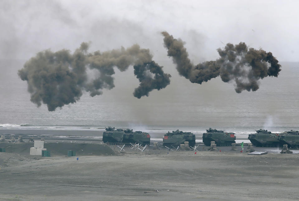 FILE - Taiwan's military holds drills of the annual Han Kuang military exercises that simulate an anti-landing operations near the coast in New Taipei City, northern Taiwan, Thursday, July 27, 2023. Taiwan military mobilized for routine defense exercises from July 24-28. The U.S. is set to announce $345 million in military aid for Taiwan, two U.S. officials said Friday. It would be the Biden administration's first major package drawing on America's own stockpiles under a new policy intended to speed up military aid to help Taiwan counter China. (AP Photo/Chiang Ying-ying, File)