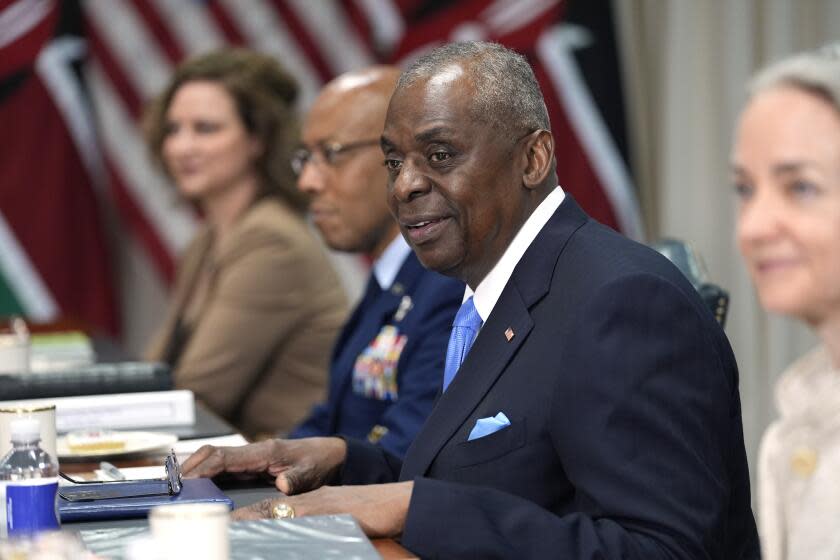 Defense Secretary Lloyd Austin smiles after members of the media are asked to leave following a meeting with Kenya's President William Ruto at the Pentagon in Washington, Friday, May 24, 2024. (AP Photo/Susan Walsh)