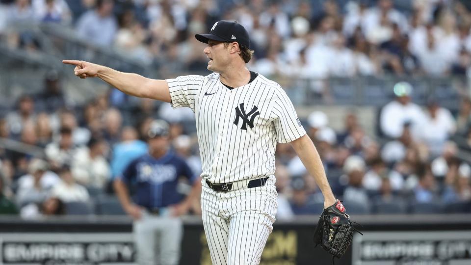 Jul 19, 2024; Bronx, New York, USA; New York Yankees starting pitcher Gerrit Cole (45) reacts after retiring the side in the second inning against the Tampa Bay Rays at Yankee Stadium. Mandatory Credit: Wendell Cruz-Imagn Images