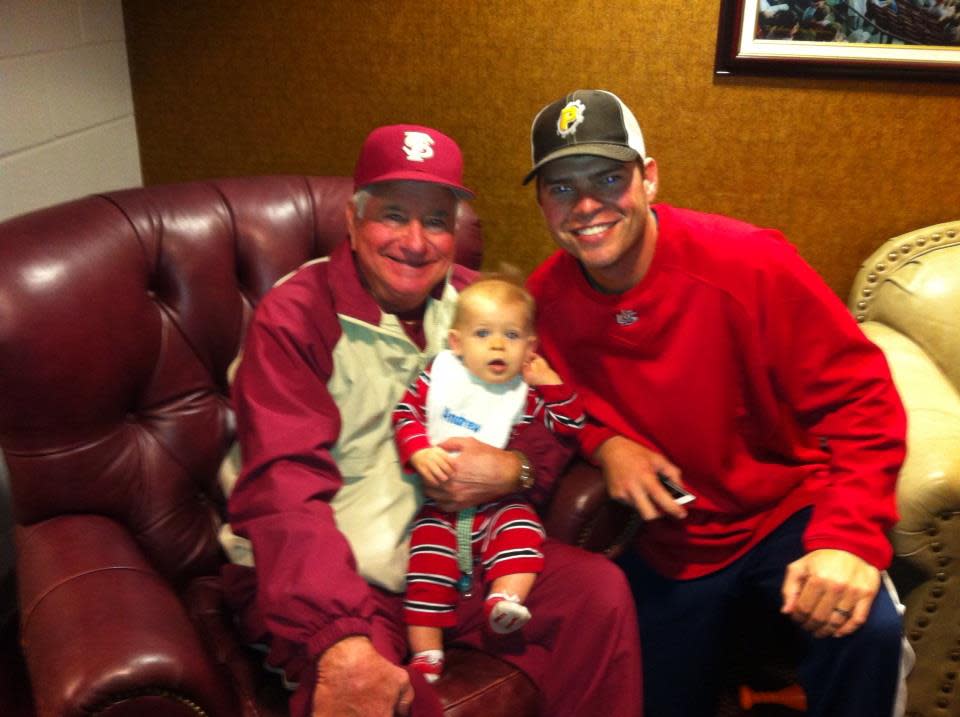 Bryan Henry and his son AJ with FSU baseball coach Mike Martin in 2012.