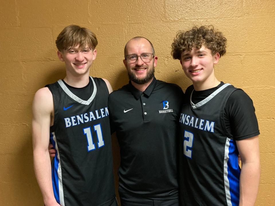 Bensalem coach Ron Morris (center) and sons Antonio (left) and Noah were all smiles after Tuesday's win over Central Bucks West.