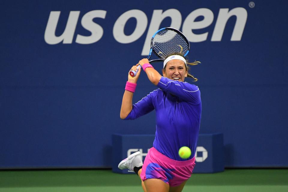 Victoria Azarenka hits a backhand against Elise Mertens during her 6-1, 6-0 quarterfinal win.