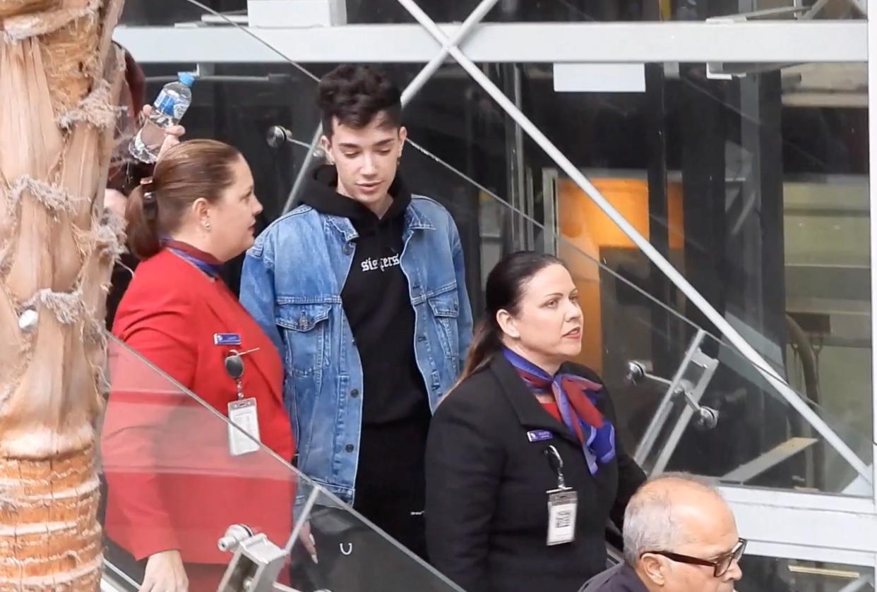 James Charles has been escorted through Brisbane Airport in his first public sighting since losing millions of followers. Photo: Backgrid Australia