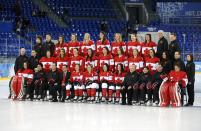 Canada's women's hockey team poses for pictures ahead of the 2014 Sochi Winter Olympics February 6, 2014. The women's ice hockey competition begins on February 8 REUTERS/Mark Blinch (RUSSIA - Tags: SPORT OLYMPICS ICE HOCKEY)