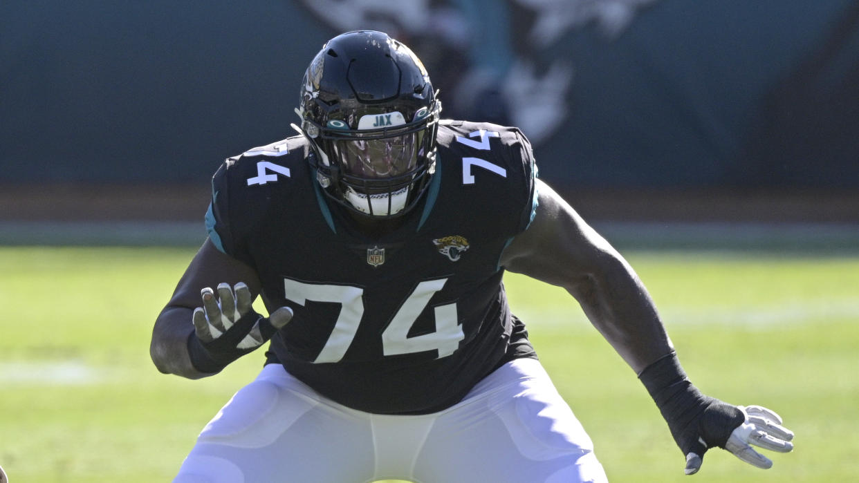 Jacksonville Jaguars offensive tackle Cam Robinson (74) sets up to block during the first half of an NFL football game against the Chicago Bears, Sunday, Dec. 27, 2020, in Jacksonville, Fla. (AP Photo/Phelan M. Ebenhack)