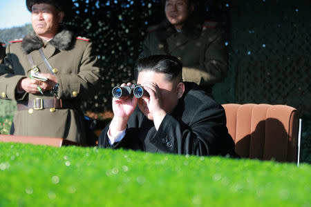 North Korean leader Kim Jong Un guides the combat drill of the service personnel of the special operation battalion of KPA Unit 525 in this undated photo released by North Korea's Korean Central News Agency (KCNA) in Pyongyang on December 11, 2016. KCNA via REUTERS