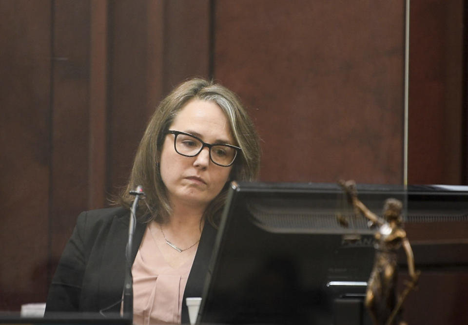 Forensic psychology expert Mary Elizabeth Wood reviews the YouTube video of Travis Reinking describing the day he was having, believing someone broke into his home, lifted the toilet seat up and touched his laptop, in court on day four of the mass murder trial at Justice A.A. Birch Building in Nashville, Tenn., Thursday, Feb. 3, 2022. (Stephanie Amador/The Tennessean via AP, Pool)