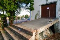 A view of the rear entrance of the disco 'Lanterna Azzurra' in Corinaldo, central Italy, Saturday, Dec. 8, 2018. Italian police say a stampede at a rap concert in an overcrowded disco killed five young teenagers early Saturday along with a woman who had brought her daughter to the event. Fifty-three others were injured at the disco in central Italy where Italian rapper Sfera Ebbasta was to perform. Authorities said organizers had apparently sold too many tickets. Police say 13 of the injured are in serious condition. (Pasquale Bove/ANSA via AP)