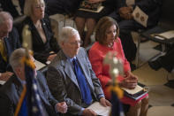 House Speaker Nancy Pelosi and Senate Majority Leader Mitch McConnell of Ky., join Congressional leadership and other members of Congress at a Congressional Gold Medal ceremony honoring amyotrophic lateral sclerosis (ALS) advocate and former National Football League (NFL) player, Steve Gleason, in Statuary Hall on Capitol Hill, Wednesday, Jan. 15, 2020, in Washington. (AP Photo/Manuel Balce Ceneta)