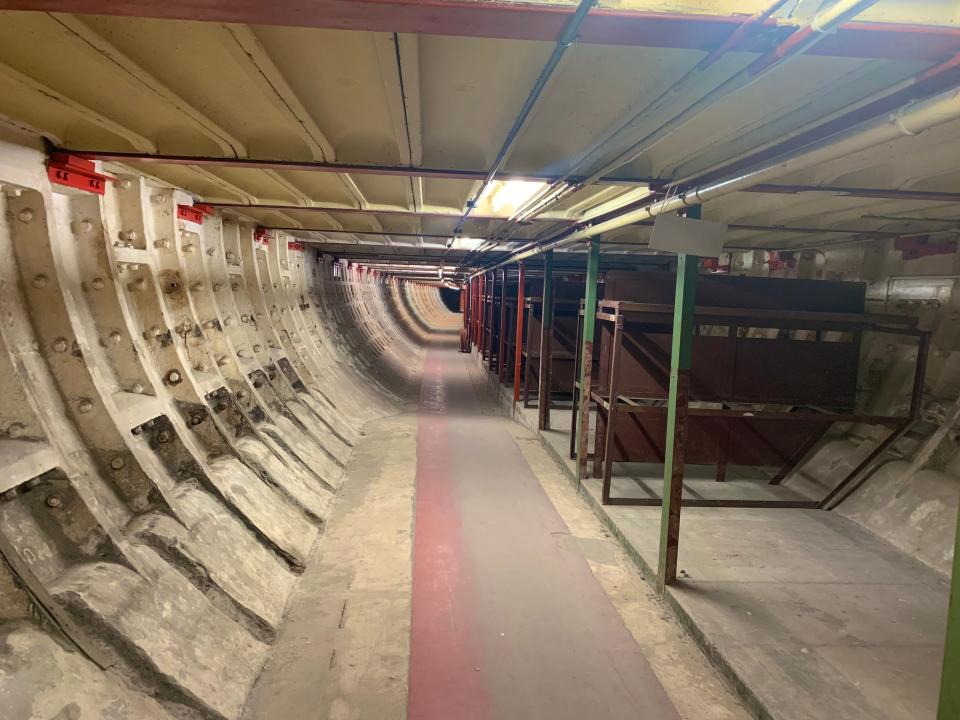 Inside the deep level shelter underneath Clapham South station, London.