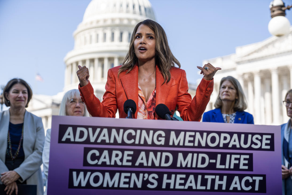 UNITED STATES - MAY 2: Halle Berry speaks during a news conference on bipartisan legislation to raise federal research on menopause and women's midlife health, outside the U.S. Capitol on Thursday, May 2, 2024. In the background from left, Sens. Amy Klobuchar, D-Minn., Patty Murray, D-Wash., and  Lisa Murkowski, R-Alaska, also appear. (Tom Williams/CQ-Roll Call, Inc via Getty Images)