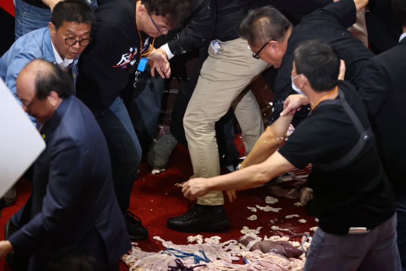 Pork intestines are seen during a scuffle in the parliament in Taipei