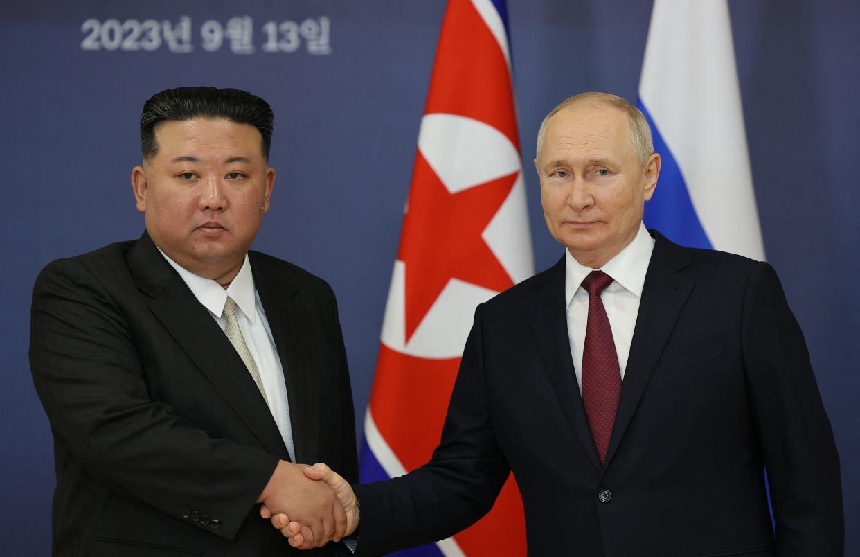 Russian President Vladimir Putin and North Koreas leader Kim Jong Un shake hands during their meeting at the Vostochny Cosmodrome in the Amur region on Sept. 13 ahead of planned talks that could lead to a weapons deal with the Russian President.