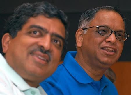 N. R. Narayana Murthy (R) and Nandan M. Nilekani of Infosys Technologies Ltd., attend a news conference in Bengaluru, April 14, 2006. REUTERS/Jagadeesh Nv/Files