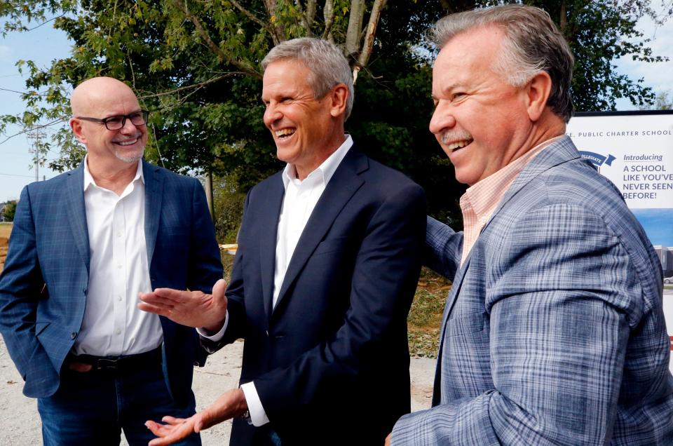 Tennessee Governor Bill Lee, middle shares a laugh with Daryl Macklin, the founder and Executive Director of A Soldier's Child, left and Mike Sparks, Tennessee State Representative, right, following the Rutherford Collegiate Prep (RCP) groundbreaking ceremony with Tennessee Governor Bill Lee, in Murfreesboro, Tenn. on Thursday, Oct. 12, 2023. This will be the first public charter school to be built in Rutherford County.