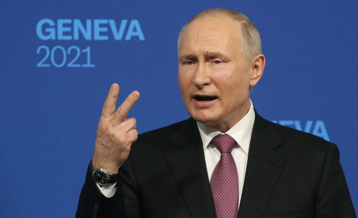 <span class="caption">V is for victory? Or vanquished? </span> <span class="attribution"><a class="link " href="https://www.gettyimages.com/detail/news-photo/russian-president-vladimir-putin-speaks-during-his-press-news-photo/1233489401?adppopup=true" rel="nofollow noopener" target="_blank" data-ylk="slk:Mikhail Svetlov/Getty Images;elm:context_link;itc:0;sec:content-canvas">Mikhail Svetlov/Getty Images</a></span>