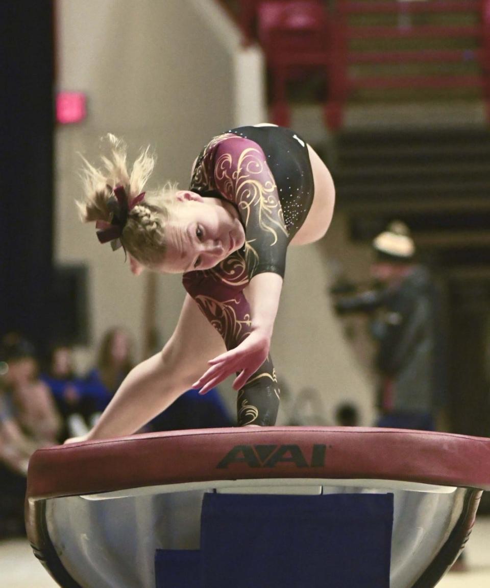 Bloomington North's Hope Taylor gets ready to spring off the vault table during the IHSAA state gymnastics meet on Saturday, March 11, 2023.