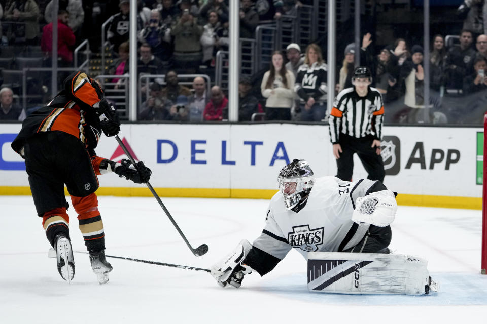 Los Angeles Kings goaltender David Rittich, right, blocks a shot by Anaheim Ducks left wing Alex Killorn during the shootout in an NHL hockey game Saturday, Feb. 24, 2024, in Los Angeles. (AP Photo/Ryan Sun)