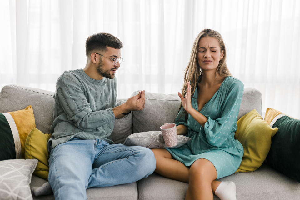 Shot of a young couple having an argument at home