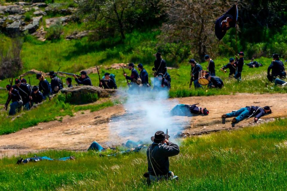 A Confederate soldier fires on a Union line during a Civil War reenactment in Knights Ferry, Calif. east of Modesto the weekend of March 25 and 26, 2023. Richard B. Raef/Working Ranch Photography