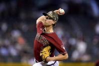 Arizona Diamondbacks starting pitcher Luke Weaver throws a pitch against the Washington Nationals during the first inning of a baseball game Sunday, May 16, 2021, in Phoenix. (AP Photo/Ross D. Franklin)