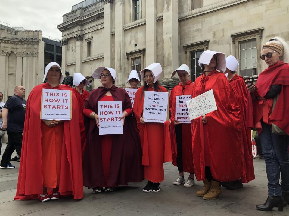 Handmaids Against Trump protest against the rollback in reproductive rights under U.S. President Trump at the anti-Trump demonstration in central London on Tuesday 4 June 2019. | Madeline Roache