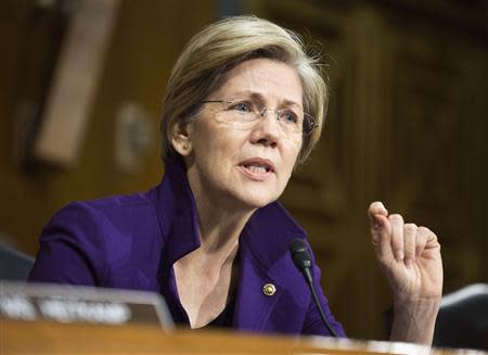 Senator Elizabeth Warren (D-MA) questions U.S. Federal Reserve Vice Chair Janet Yellen (not pictured) during a Senate Banking Committee confirmation hearing on Yellen's nomination to be the next chairman of the Federal Reserve, on Capitol Hill in Washington in this November 14, 2013, file photo. REUTERS/Joshua Roberts