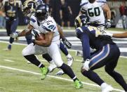 Oct 28, 2013; St. Louis, MO, USA; Seattle Seahawks running back Marshawn Lynch (24) runs the ball against the St. Louis Rams during the second half at Edward Jones Dome. The Seahawks defeat the Rams 14-9. Mandatory Credit: Jasen Vinlove-USA TODAY Sports