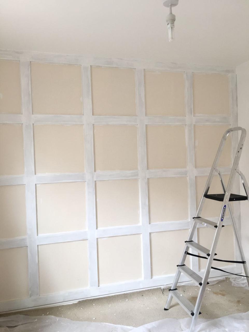 primer painted on wooden wall panels
