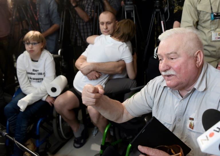 Poland's freedom icon Lech Walesa rallied behind a group of young disabled Poles who have spent 34 days camped out at parliament demanding the right-wing government increase their meagre living allowance