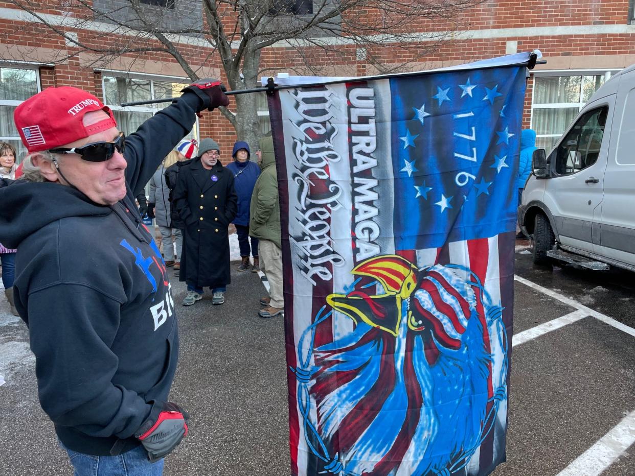 Geo Mann of Seabrook, who calls himself “MAGA Mann” stands outside in cold weather waiting to see Republican presidential candidate Donald Trump in Portsmouth Wednesday Jan. 17,2024.