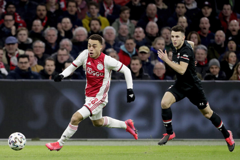 AMSTERDAM, NETHERLANDS - MARCH 1: (L-R) Sergino Dest of Ajax, Oussama Idrissi of AZ Alkmaar  during the Dutch Eredivisie  match between Ajax v AZ Alkmaar at the Johan Cruijff Arena on March 1, 2020 in Amsterdam Netherlands (Photo by Soccrates/Getty Images)