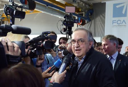 FILE PHOTO: Fiat Chrysler Automobiles CEO Sergio Marchionne leaves at the end of a news conference in Balocco, northern Italy, June 1, 2018. REUTERS/Massimo Pinca/File Photo