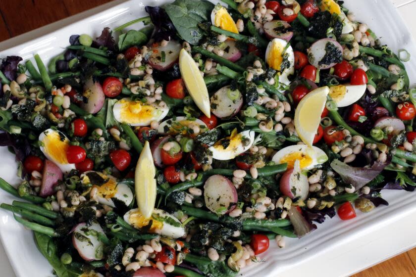 A white and green bean vegetarian salade nicoise.