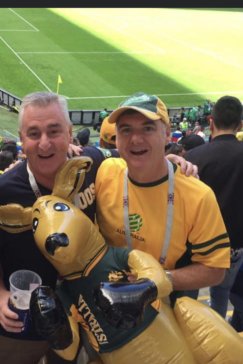 Australian football fan Jamie Davidson (pictured right) won't be visiting the Qatar World Cup in 2022. (Image: Supplied)