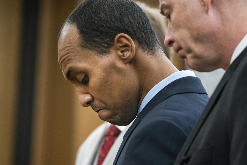 Former Minneapolis police officer Mohamed Noor reads a statement Friday, June 7, 2019, in Minneapolis, before being sentenced by Judge Kathryn Quaintance in the fatal shooting of Justine Ruszczyk Damond. Noor, convicted of shooting an unarmed woman to death as she walked toward his cruiser says he can't apologize enough "for taking the life of a perfect person. He sentenced Friday to 121/2 years in prison for the shooting. (Leila Navidi//Star Tribune via AP, Pool)