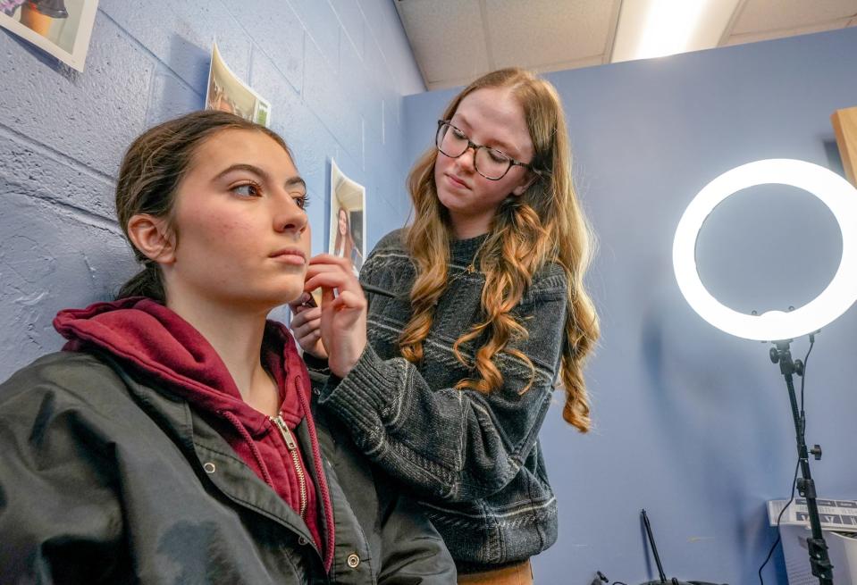 Classmate Eliza Gencarella models for makeup artist Emmalee Bettez. In her work on the film "My Acting Coach Nightmare," Bettez said, she learned that a movie makeup job involves "a lot of waiting, but once you're needed, you have to be very quick about it."