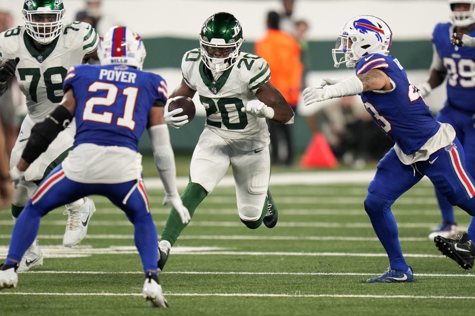 New York Jets running back Breece Hall (20) carries the ball against the Buffalo Bills during the third quarter of an NFL football game, Monday, Sept. 11, 2023, in East Rutherford, N.J. (AP Photo/Seth Wenig)
