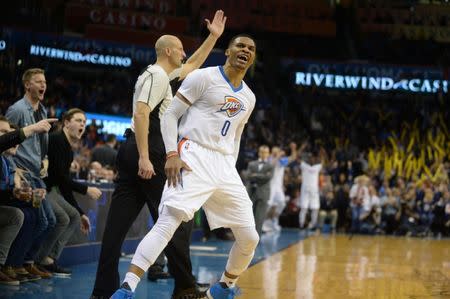 Jan 26, 2017; Oklahoma City, OK, USA; Oklahoma City Thunder guard Russell Westbrook (0) reacts after a play against the Dallas Mavericks during the fourth quarter at Chesapeake Energy Arena. Mandatory Credit: Mark D. Smith-USA TODAY Sports