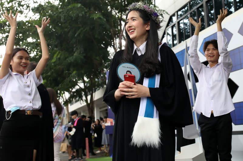 Students attend their graduation ceremony led by King Maha Vajiralongkorn, at Thammasat University in Bangkok