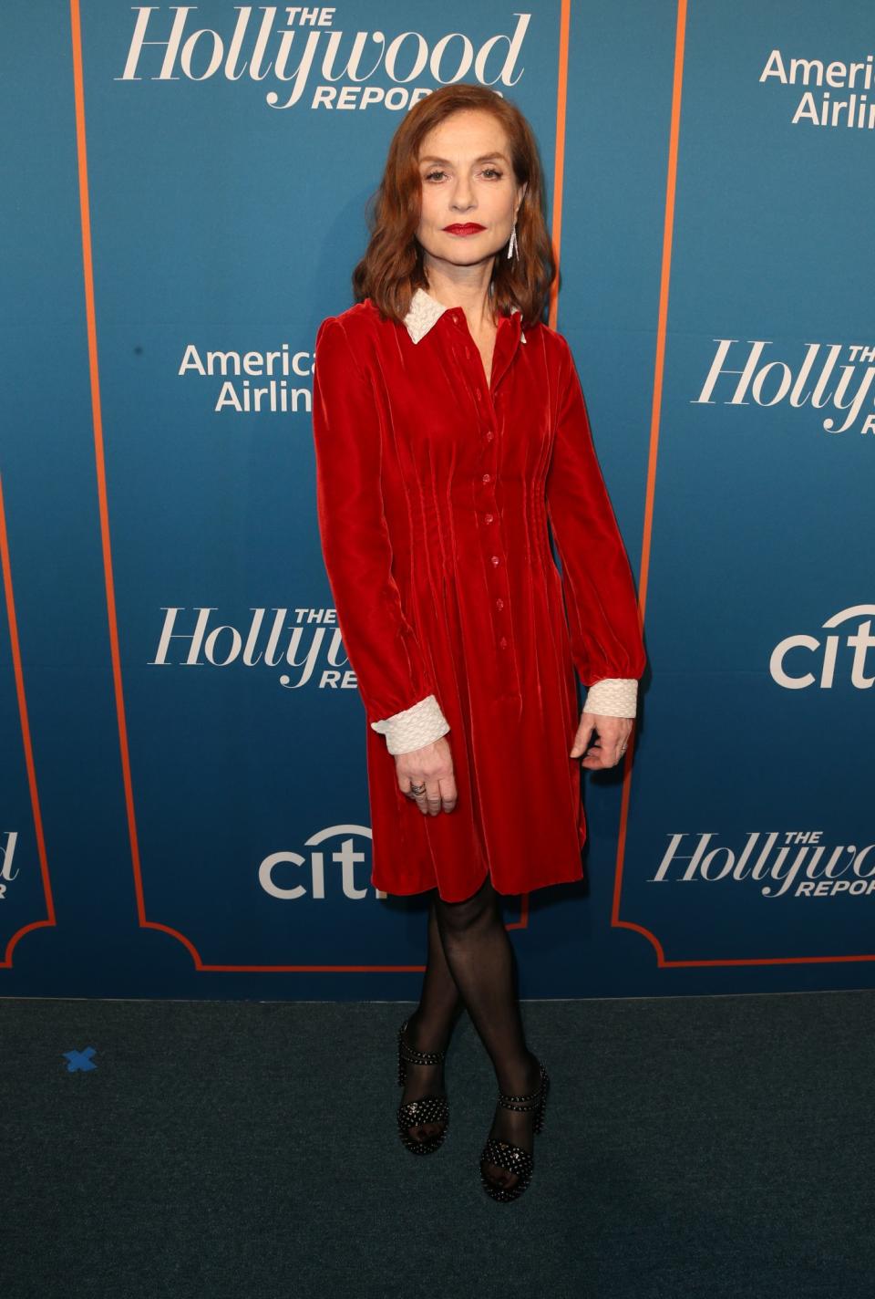 <p>Isabelle stood out in a red Victorian-style shirt dress and studded platforms. Let’s hope we look this good at 63. <i>[Photo: Getty]</i> </p>