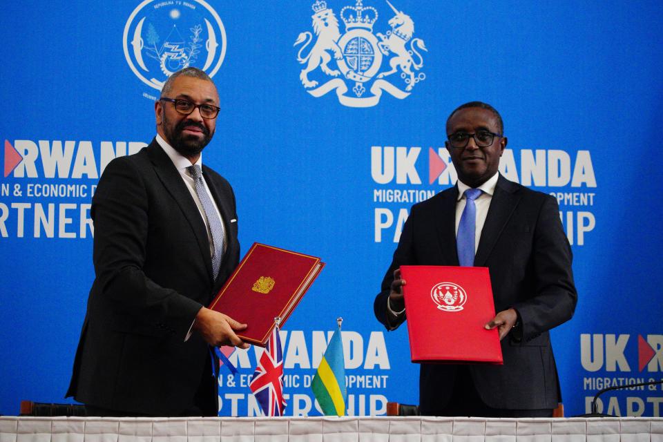 Home Secretary James Cleverly meeting Rwandan Minister of Foreign Affairs Vincent Biruta sign a new treaty with Rwanda on December 5 (Getty Images)